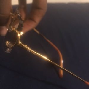 Cartier frame glasses with a lil tan tent